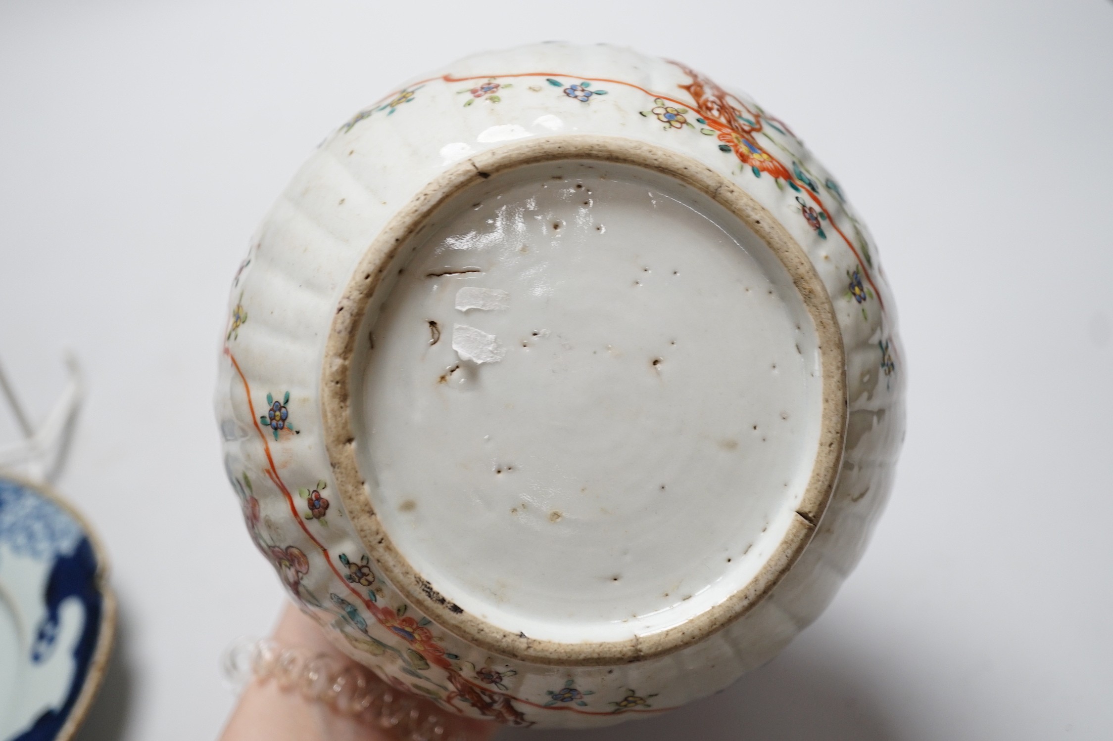 A Chinese Kangxi period clobbered bottle vase, reduced, height 29.5cm, and a Chinese plate, vase 18cms high